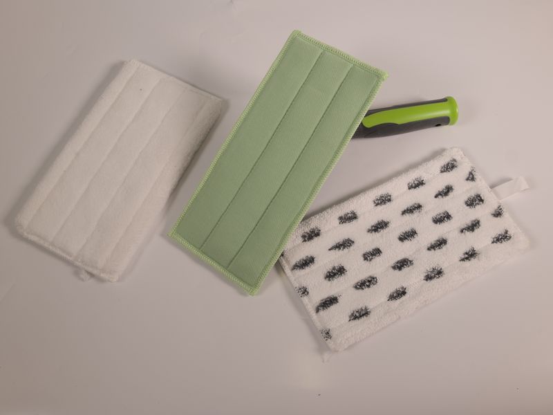 Three flat microfibre cleaning pads laid side by side