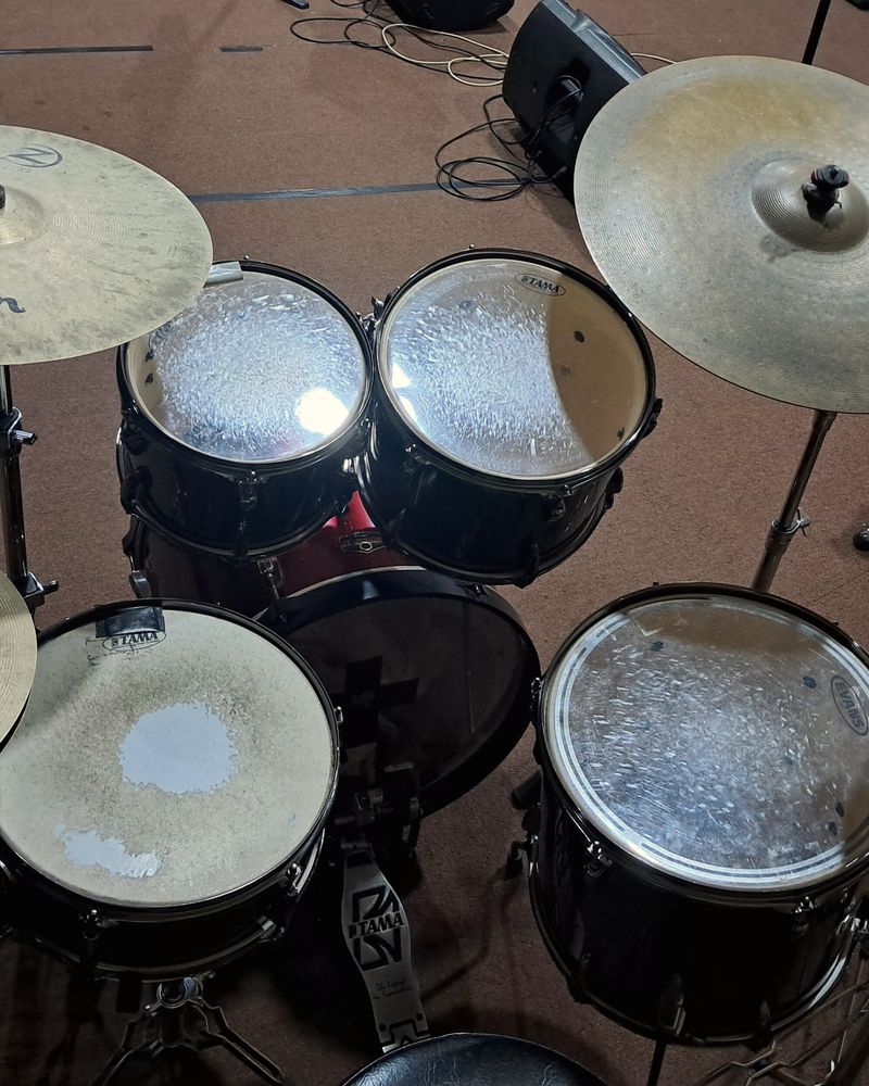 A drum kit with cymbals, seen from above
