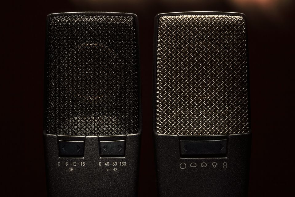 Close-up of the mesh grille of a studio condenser microphone