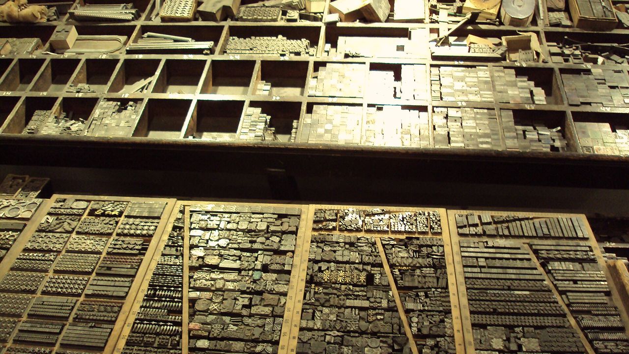 Drawers of old printers’ type and ornaments in wooden cases