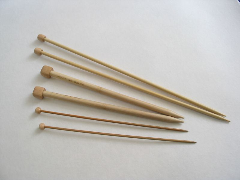 Bamboo knitting needles laid side by side