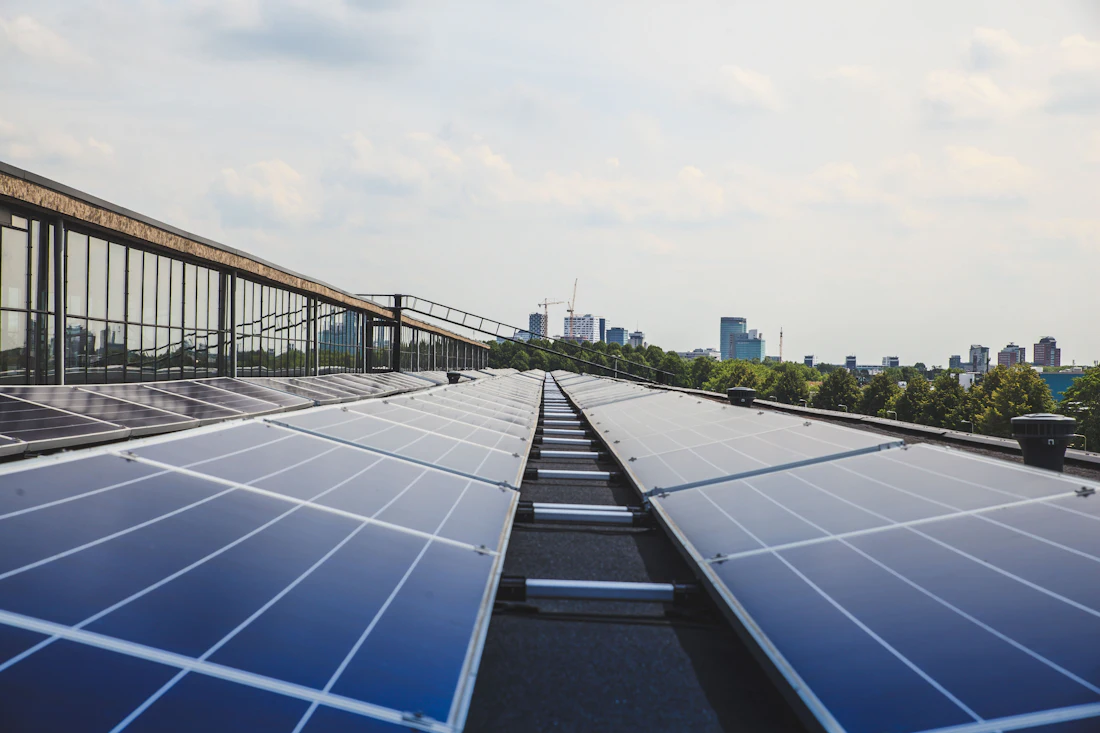 Rows of panels on a large commercial roof