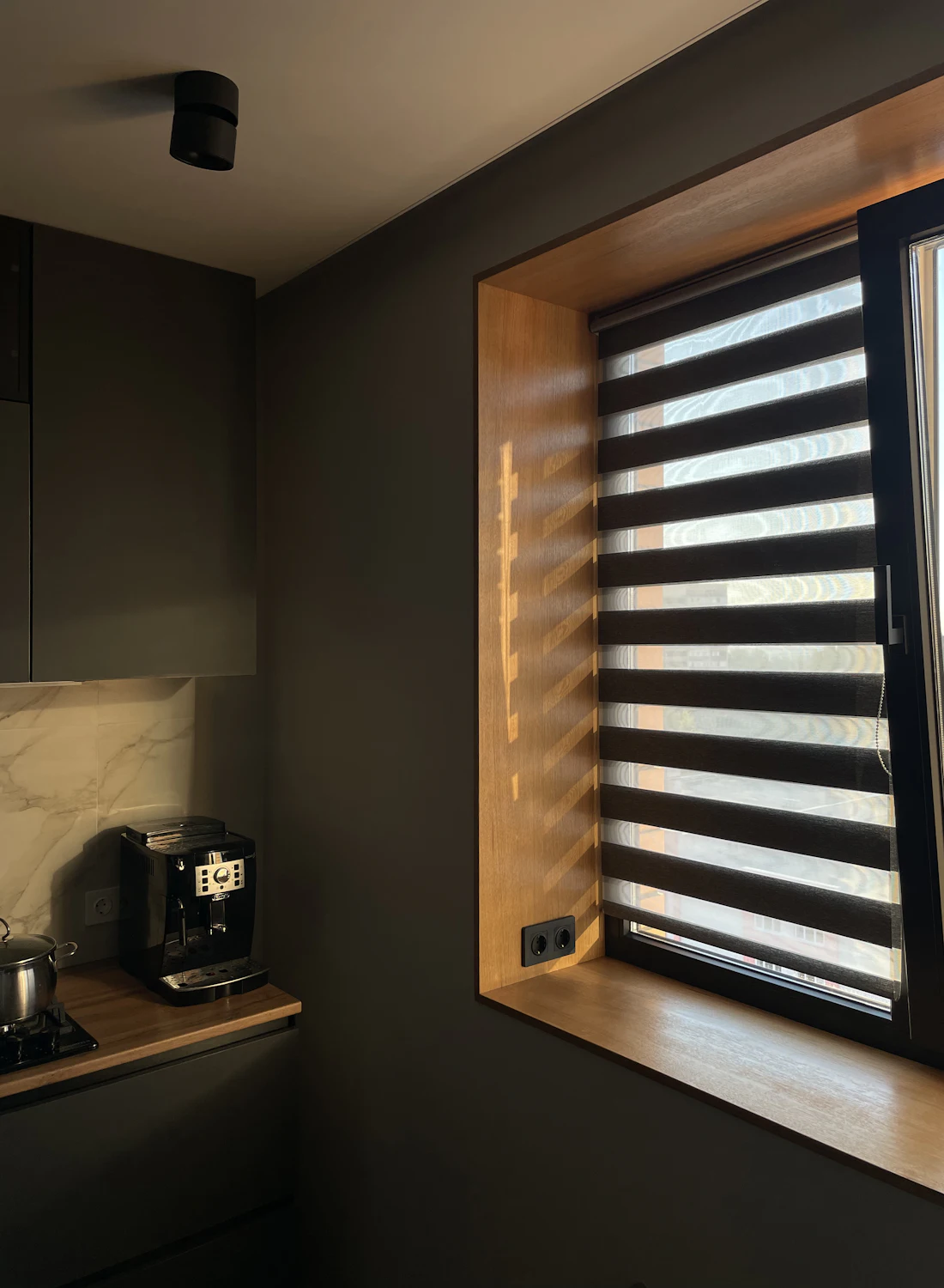 Wooden blinds with sunlight through them