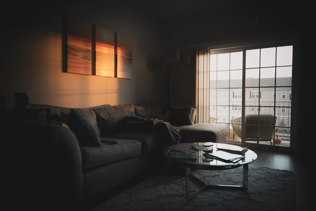 A living room in warm evening light
